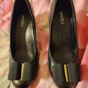 Vaneli Black Stacked Heels with Gold Accent Bow